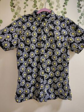 Vitriol "Black With White Flowers Melting Smiley Face" Medium